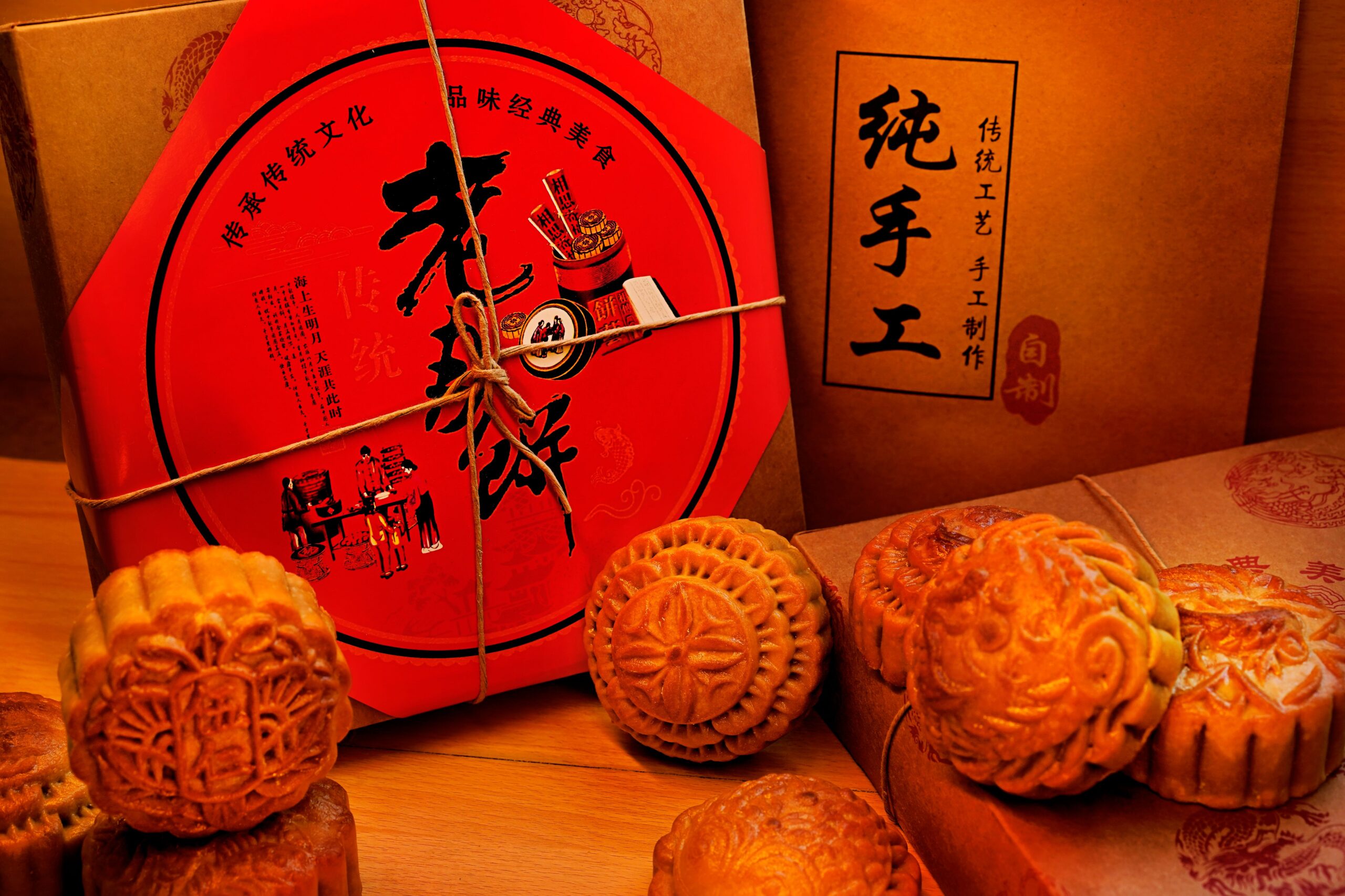 Delicious handmade mooncakes displayed with beautiful traditional packaging.